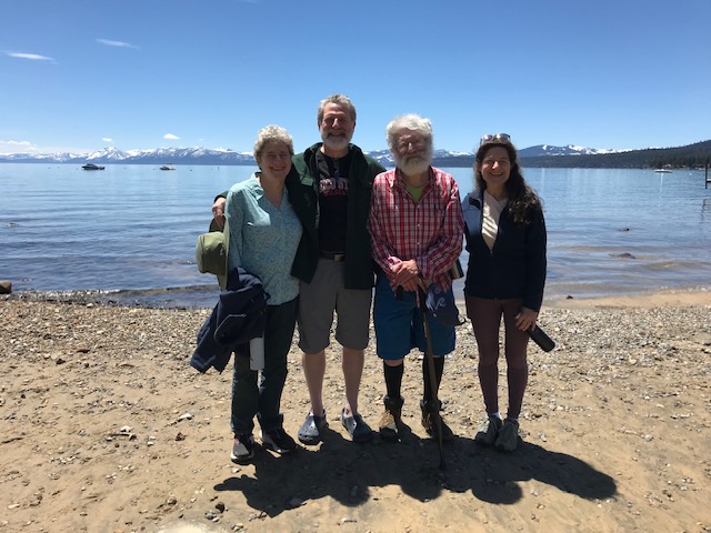 Eric & siblings on a beach