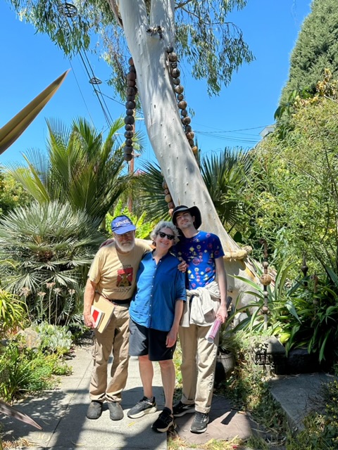 Eric, Linda, & Eli in an art garden